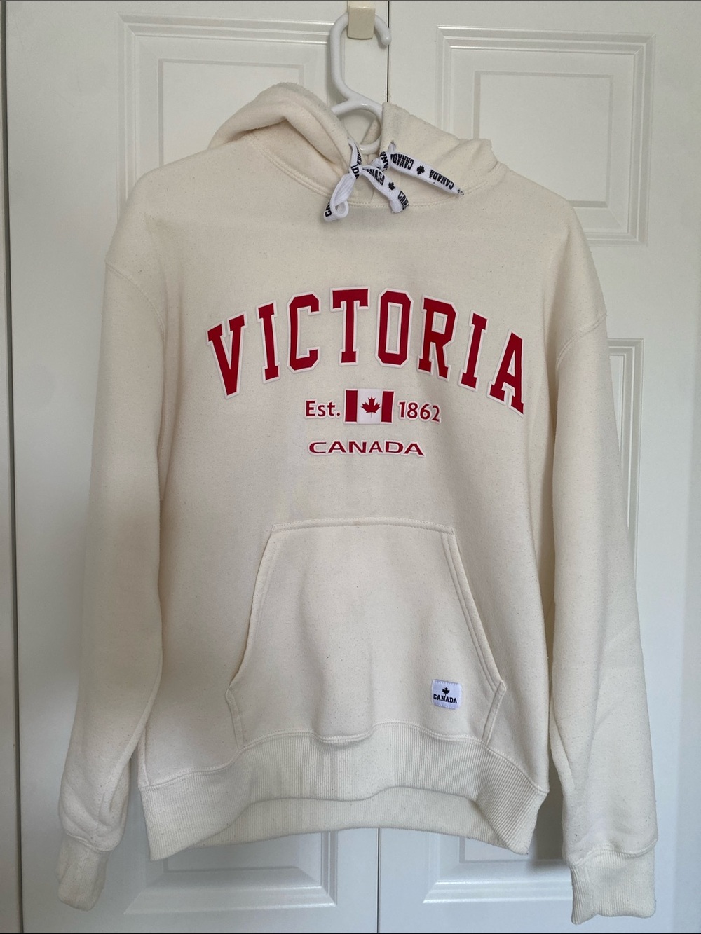Victoria Canada Cream Hoodie with Red Lettering